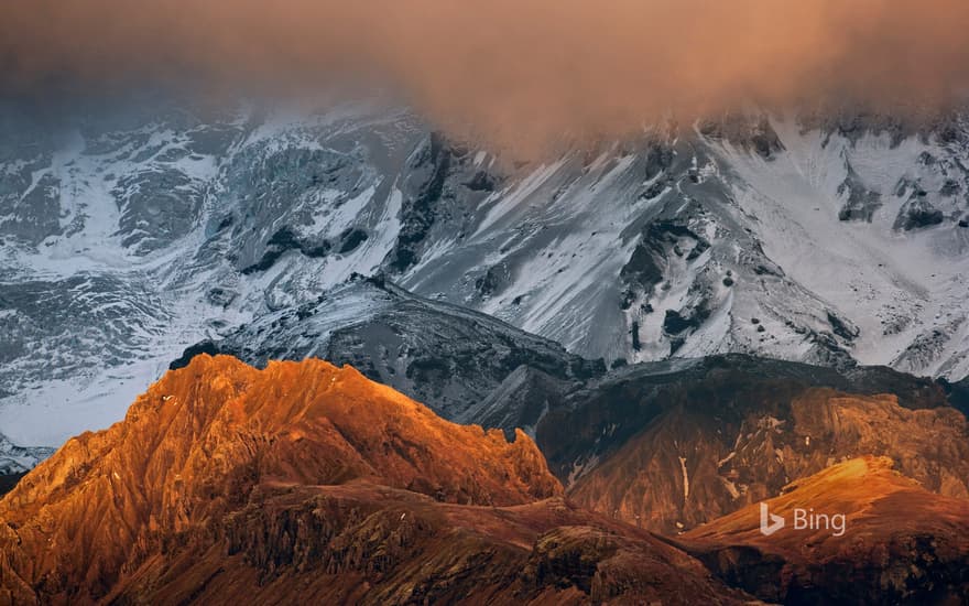 Sunlit ridges against volcanic scree on Eyjafjallajökull, a volcano in Iceland